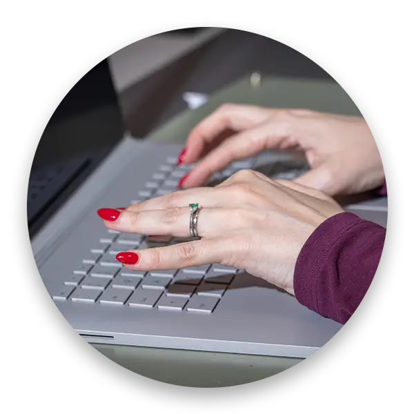 Close up of Cipher IT team member using keyboard